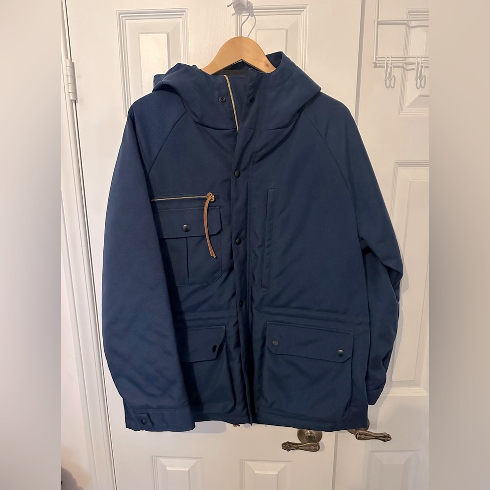 New Woolrich quilt lined fall/winter jacket. Made in USA. Size L.